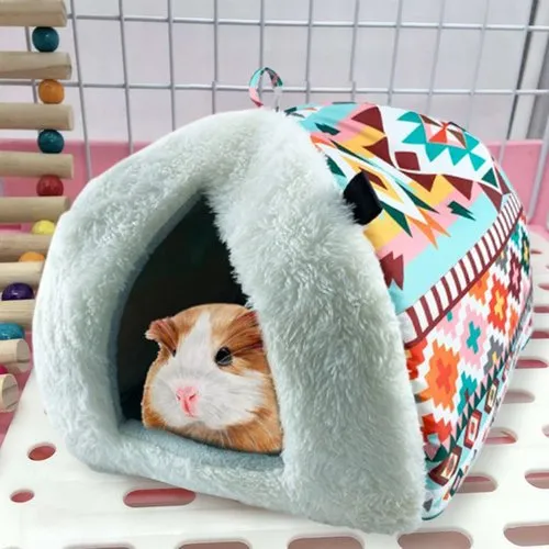 A Picture Showing a Guinea Pig's Cage Covered With a Blanket